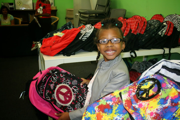 Alameda Point Collaborative resident receives backpack from School Supply drive