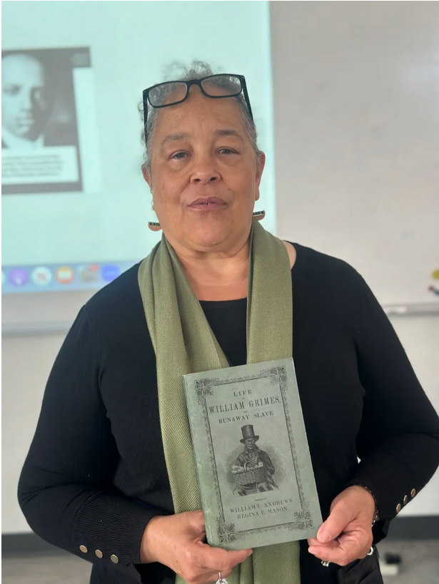 Regina Mason speaks to high school students