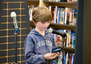 Student reading poetry