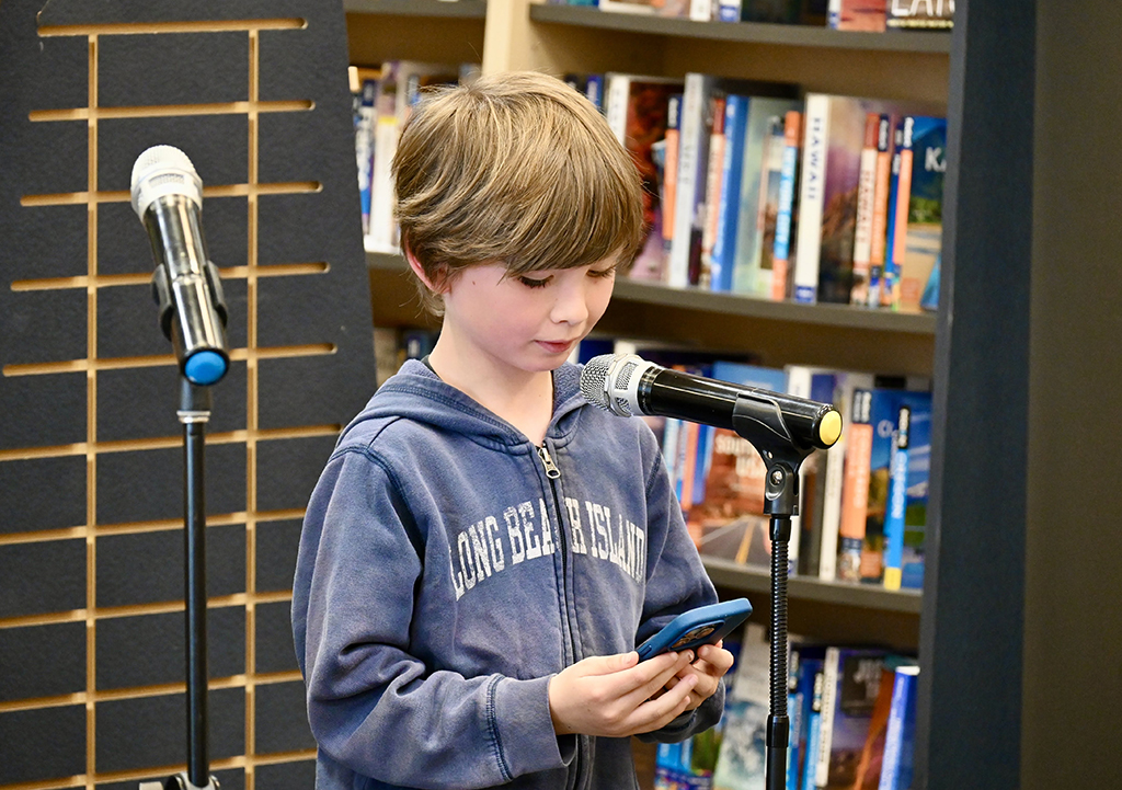 Student reading poetry