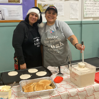 AEF staff make pancakes