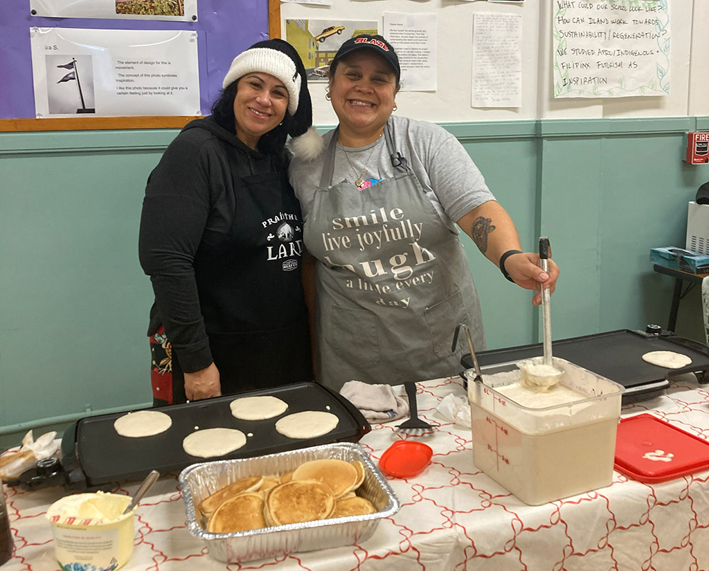 AEF staff make pancakes
